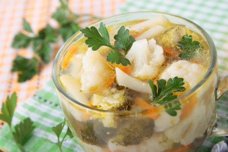 Soup of broccoli and cauliflower in a glass cupの写真素材