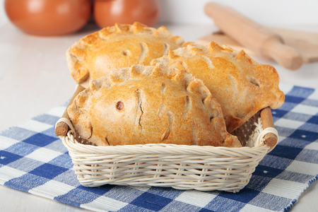 Rye patties in the shape of fish in basketの写真素材