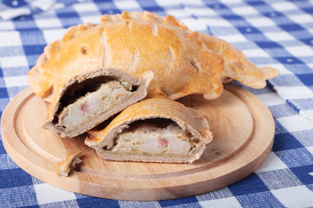 Rye patties in the shape of fish on boardの写真素材