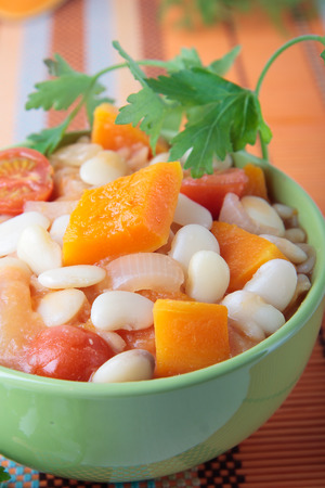 White beans stewed with pumpkin, tomato and onionの写真素材