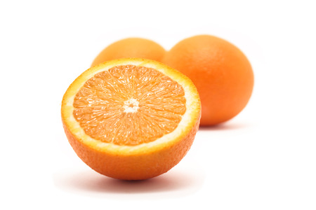 Close-up Photo of fresh Oranges on white backgroundの写真素材