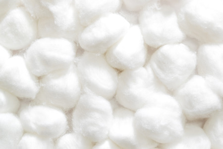 fluffy wedding of a kind originally made from raw cotton, used for cleansing wounds, removing cosmetics, and padding delicate objects.の写真素材
