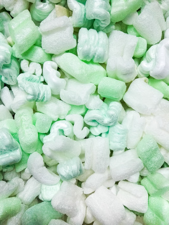 Green and white foam sponge texture backgroundの写真素材