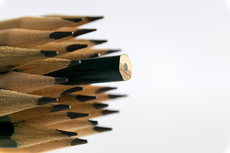 Pencils is an instrument for writing or drawing, consisting of a thin stick of graphite or a similar substance enclosed in a long thin piece of wood or fixed in a metal or plastic case.の写真素材