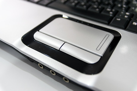 Notebook touchpad and multimedia connectors.の写真素材