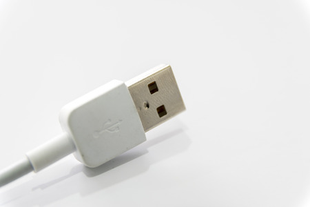 White USB connector isolated on white background.の写真素材
