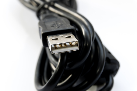Black USB connector isolated on white background.の写真素材