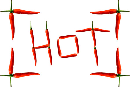 Fresh red peppers isolated on white background.の写真素材