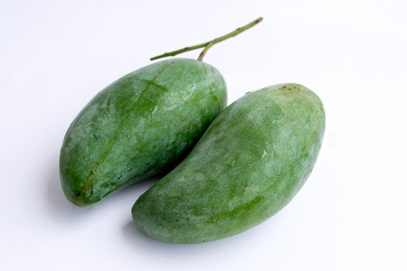 Green mango isolated on white background.の写真素材
