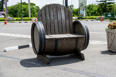Old wooden chair Made from old wine barrels.の写真素材