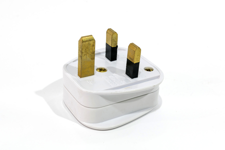Singapore male power plug isolated on white background.の写真素材