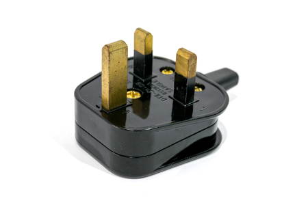 Singapore male power plug isolated on white background.の写真素材