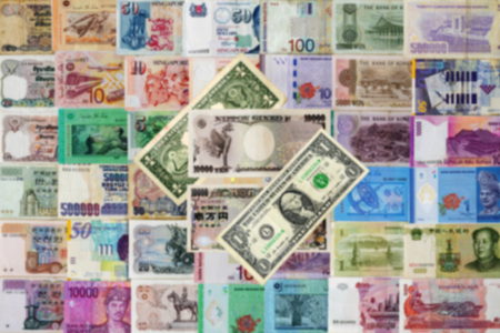 Blurred of international moneys texture background.の写真素材