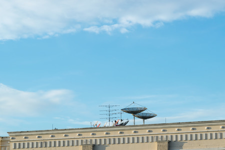 Satellite dish on the roof of the condominium.の写真素材
