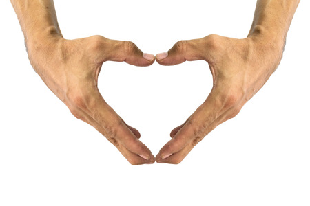 Making a heart shape with the hand symbol.の写真素材