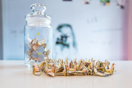 Paper birds made of newspapers.の写真素材