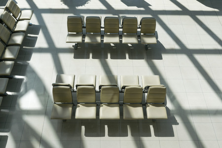 Empty chair waiting for passengers boarding at airports.の写真素材