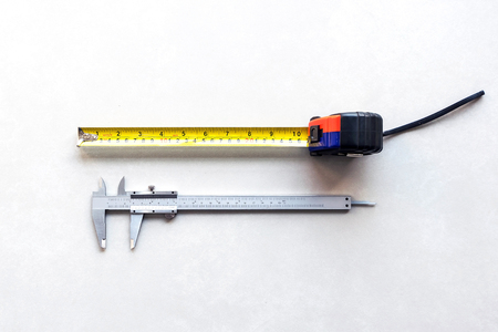 Vernier and measuring tape  is an essential tool in the engineering industry and general industries.の写真素材