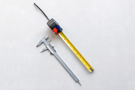 Vernier and measuring tape  is an essential tool in the engineering industry and general industries.の写真素材