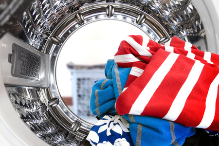 Closeup of clothes inside the washing machine.の写真素材