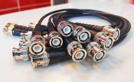 BNC connector for audio and video signals on white background.の写真素材