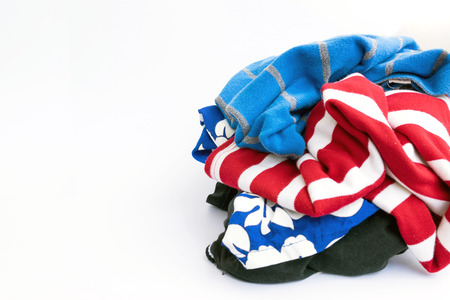 Used clothing is prepared to be washed isolated on white background.の写真素材