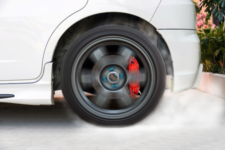 Show burning tires racing car in racetracks.の写真素材