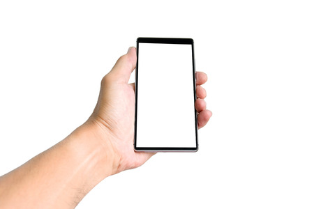 Hand holding smartphone isolated on white background.の写真素材