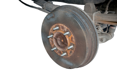 Old rusty drum brakes rear wheel of the car isolated on white background.の写真素材
