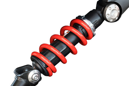 Shock absorber of motorcycle isolated on white background.の写真素材