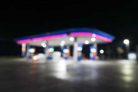 Burred of lighting as night in a lonely petrol station.の写真素材