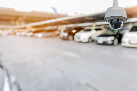 Closeup CCTV camera in the outdoor cars park with a beautiful sunlight.の写真素材