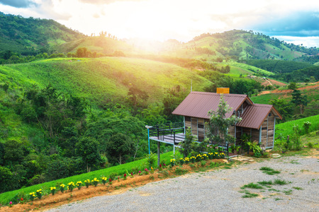 Home foothill with beautiful green nature of meadows, forests and mountains.の写真素材