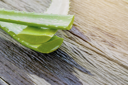 Closeup Aloe Vera leaves on wooden background.の写真素材