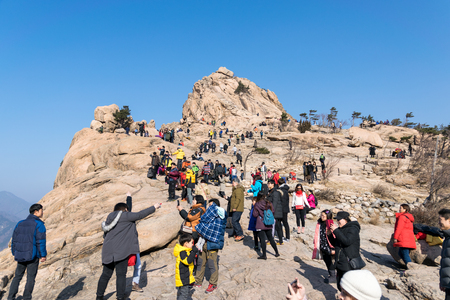 Soul,Korea-Jan 3,2016:Tourists climb to the highest point of view on top of a hill in Korea.のeditorial素材