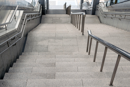 Marble staircase railing stainless steel up to the train station in the city.の写真素材