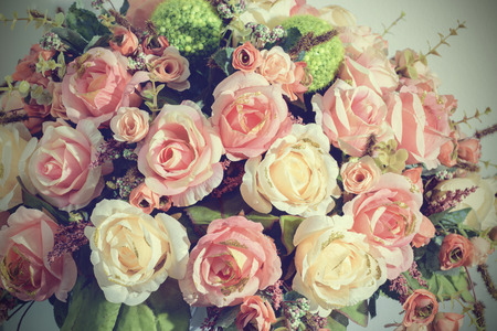 Beautiful plastic flowers vintage tone style for postcard.の写真素材