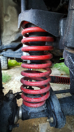 Closeup the shock absorbers and springs of a truck.の写真素材