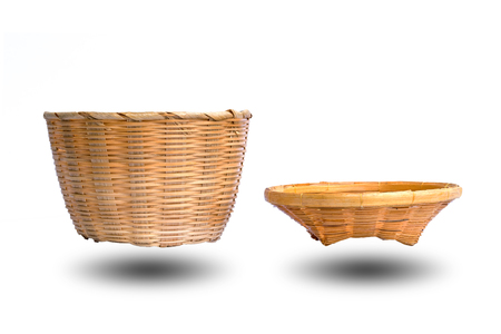 Small plates or trays made of bamboo isolated on white background.の写真素材