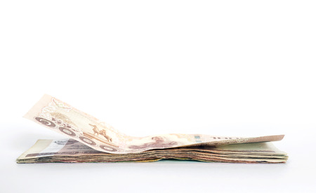 A row of Thailand's Baht isolated on white background.の写真素材