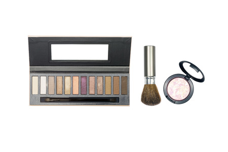 Closeup group of makeup cosmetics on white background.の写真素材