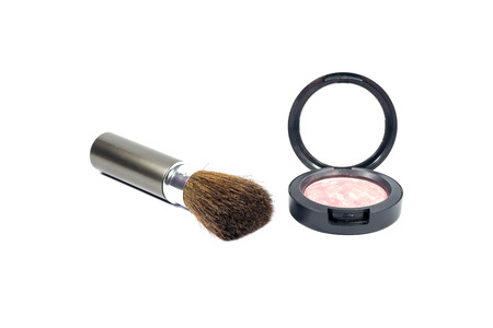 Powder makeup and brush isolated on white background.の写真素材