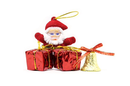 Santa Claus doll with gift box art objects for x mas days isolated on white background.の写真素材