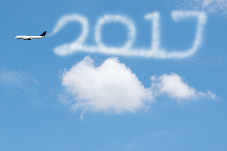 2017 figures news year drawing by airplane in the sky.の写真素材
