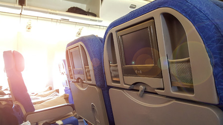 The light of the sun peeking into the window of the plane.の写真素材