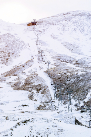 Funicular ride up on the mountain for skiers to ski down to the bottom.の写真素材