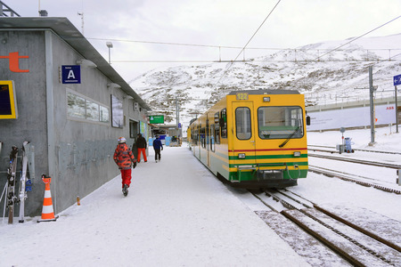 Jungfrau,Switzerland-Jan 4,2017: Scenic railway to Klein's Scheidegg mountain pass, a famous ski resort area, to admire the passing scenic valleys and the Glacier Falls.のeditorial素材