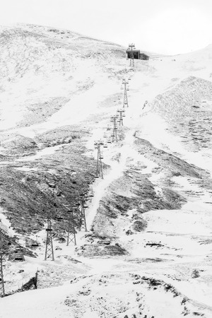 Funicular ride up on the mountain for skiers to ski down to the bottom.の写真素材