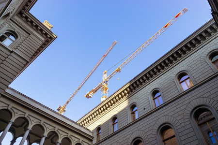 Closeup crane industry, construction, renovation of buildings in the city of Bern, Switzerland.の写真素材