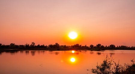 Beautiful landscape sunset at the river in the evening.の写真素材